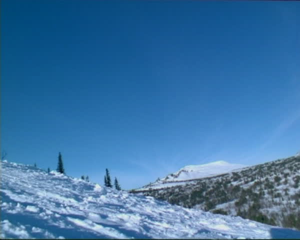 The skier glide near camera, in mountainous Shoria