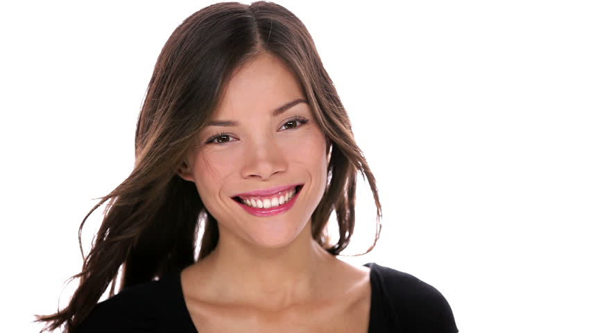 Happy woman showing thumbs up success sign. Beautiful mixed race Asian / Caucasian female model smiling happy isolated on white background. focus change to thumbs up