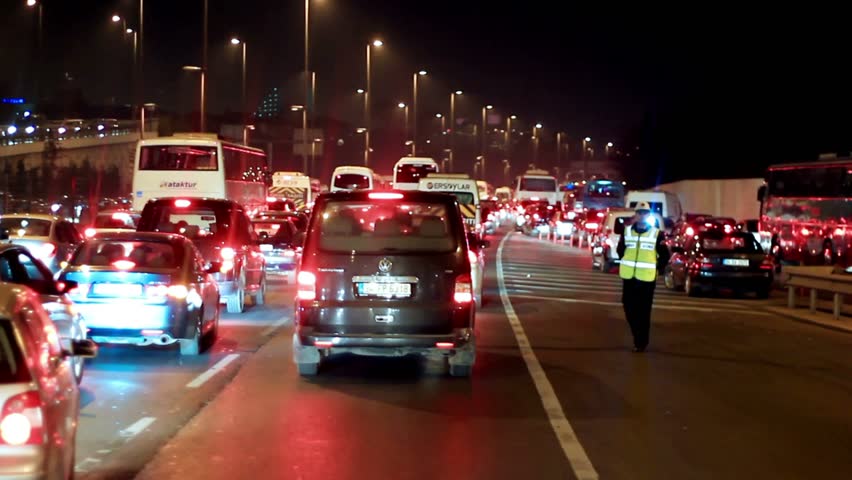 ISTANBUL - FEBRUARY 17: Traffic jam with rows of cars waiting to cross on Bosporus Bridge on February 17, 2011 in Istanbul. Trans-European Motorway (European route E 80) 