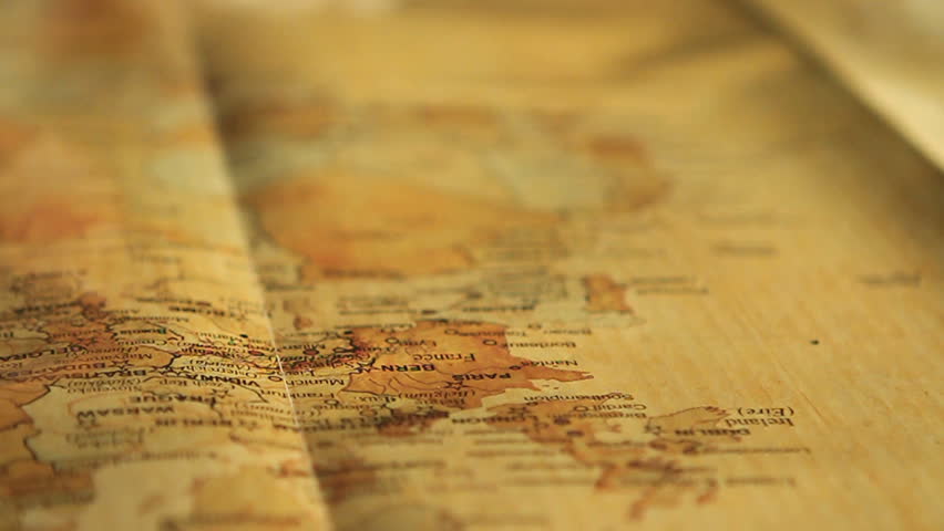 finger pointing to map