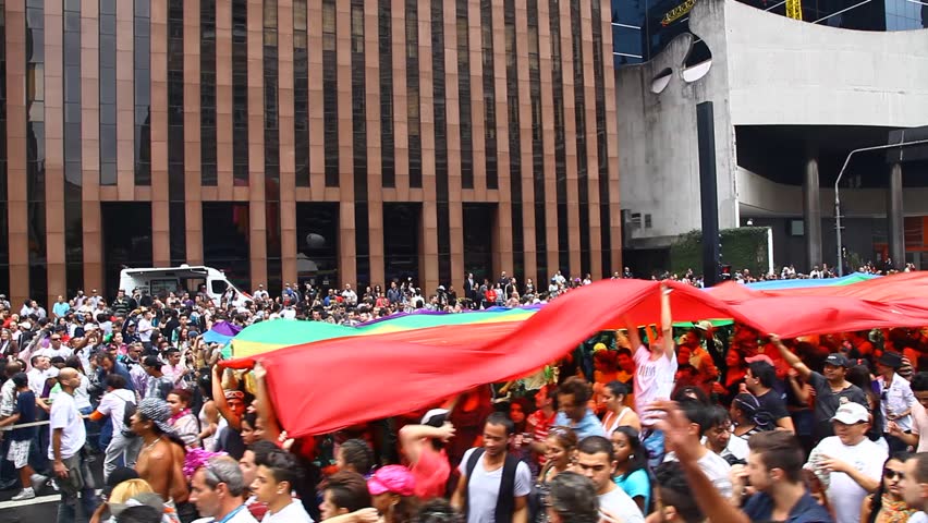 SAN PAULO, BRAZIL - CIRCA JUNE 2011: Crowds celebrate the LGBT Gay Pride Parade on Avenida Paulista circa June 2011 in San Paulo.
