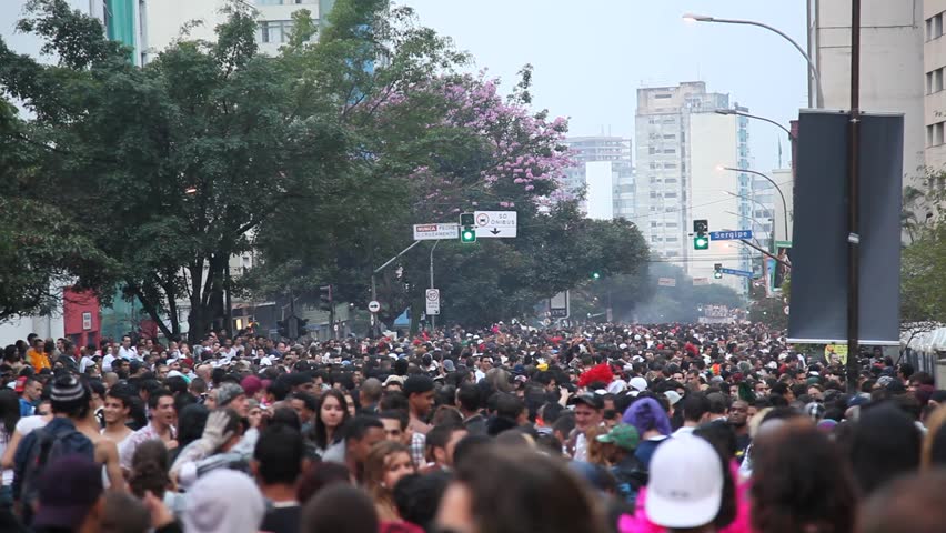 SAN PAULO, BRAZIL - CIRCA JUNE 2011: Crowds celebrate the LGBT Gay Pride Parade on Avenida Paulista circa June 2011 in San Paulo.