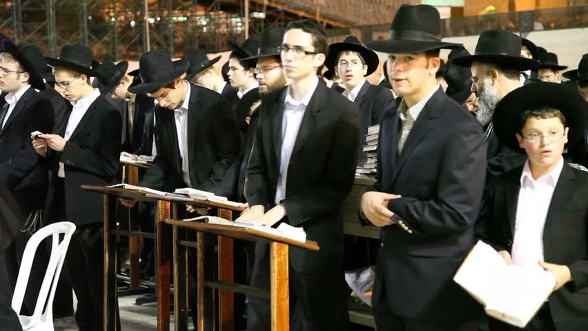 JERUSALEM, ISRAEL - OCT 6, 2011: Yeshiva students pray during Slihot at the Western Wall on October 6, 2011 in Jerusalem.