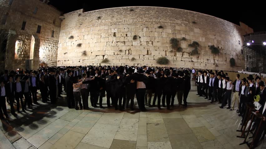 JERUSALEM, ISRAEL - OCT 6, 2011: Yeshiva students sing and dance during Slihot at the Western Wall on October 6, 2011 in Jerusalem.
