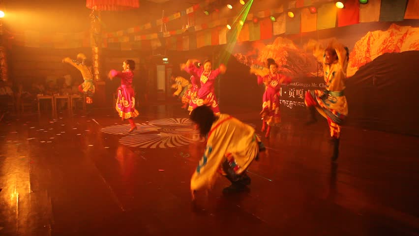 MOXI, CHINA - AUG 1, 2009: An event features Tibetan-Chinese folk dancing on August 1, 2009 in Moxi.