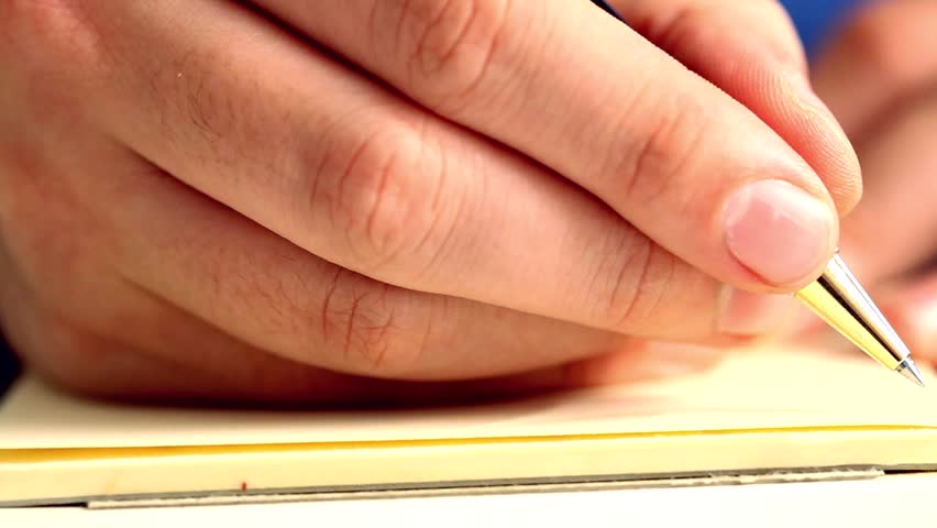 Man writing documents