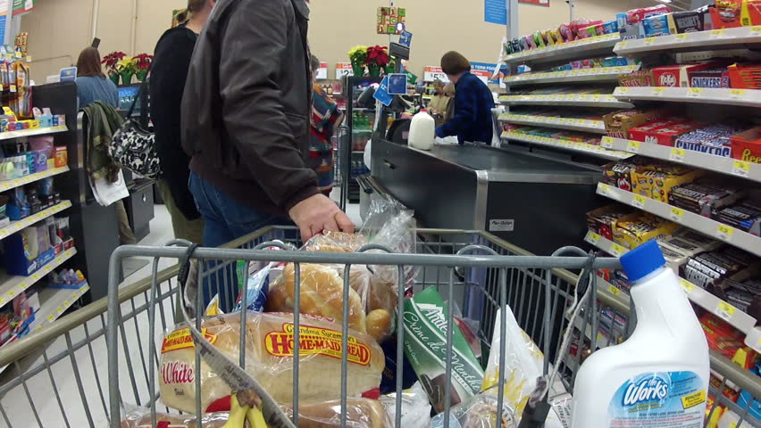 EPHRAM, UT - DEC 13 - (Fast motion) Consumers purchase goods at Walmart during the busy holiday season December 13, 2011 in Ephram, Utah.