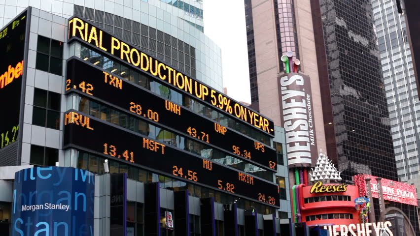 NEW YORK CITY, NY - NOVEMBER 23: Stock market news on building in Times Square the day before Thanksgiving on November 23, 2011 in New York City, New York. 