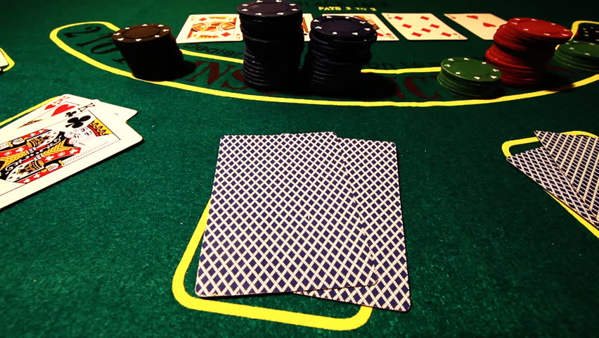 Poker table.Raise chips and showdown.Double aces.