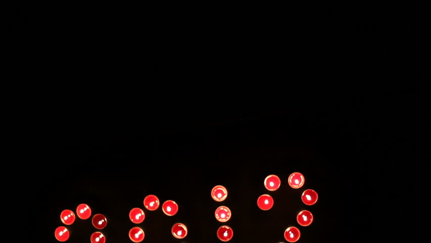 crane shot of 2012 made of candles. Tilt move. 