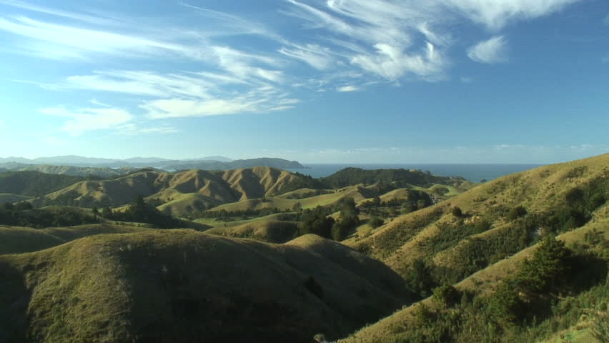 Zoom-in to WS of hilly countryside