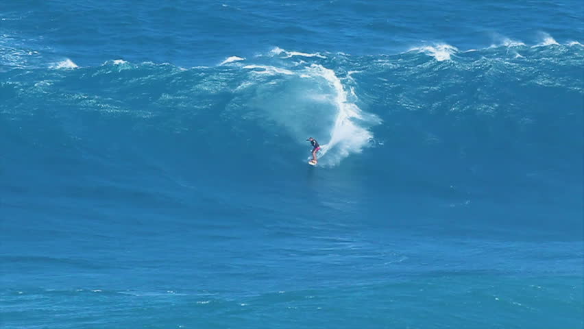 MAUI, HI - MARCH 13: Professional surfer Yuri Soledade rides a giant wave at the legendary big wave surf break known as "Jaws" during one the largest swells of the winter March 13, 2011 in Maui, HI.