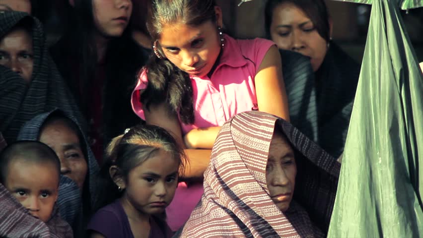TLAMACAZAPA, MEXICO - CIRCA 2011: Women and children in traditional dress participate in anniversary celebration of the old village circa 2011 in Tlamacazapa, Mexico. Tlamacazapa is an Indigenous village in the Mexican state of Guerrero. 