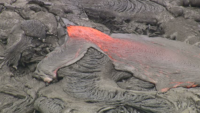 Lava flowing on slope of Mauna Loa, Hawaii