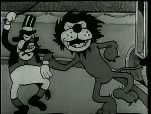 Lion and lion tamer dancing at circus