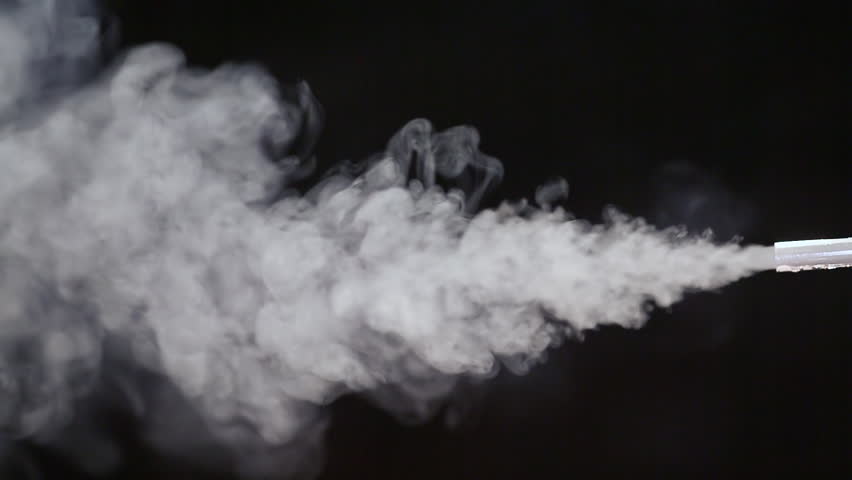 White Smoke In Super Slow Motion Appearing Against A Black Background