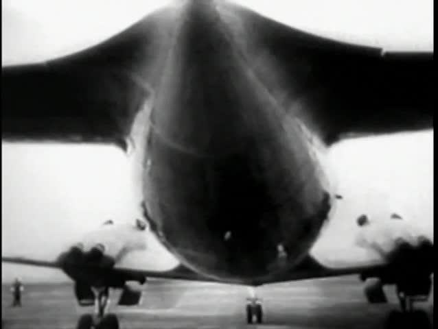 Airplane taking off and flying over city