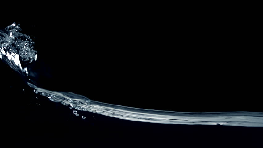 Slo-motion water  against black drop