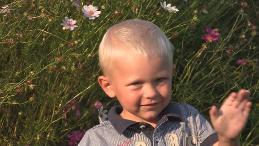 Boy waving hands