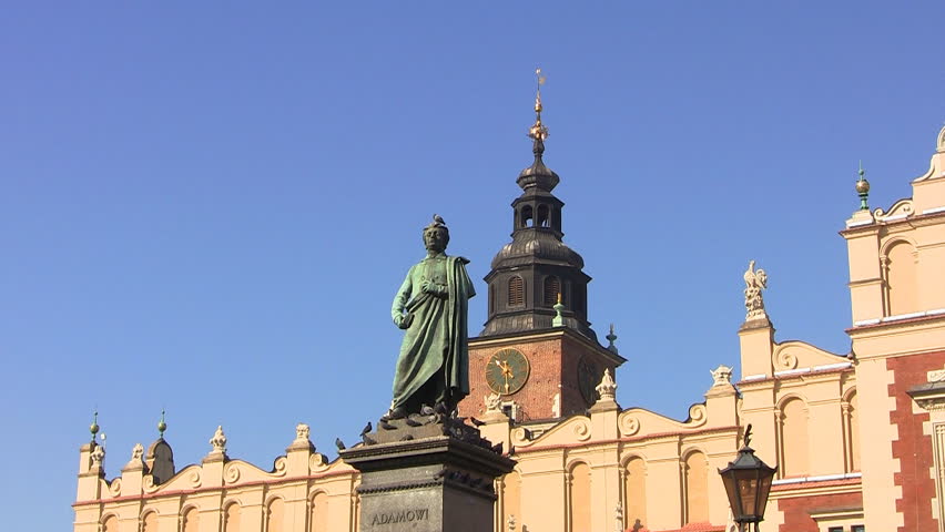 Monument of Great Polish Poet Adam Mickiewicz and Town Hall Tower, Krakow, Poland