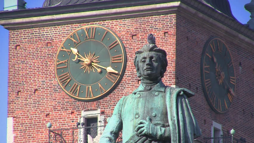 Monument of Great Polish Poet Adam Mickiewicz and Town Hall Tower, Krakow, Poland
