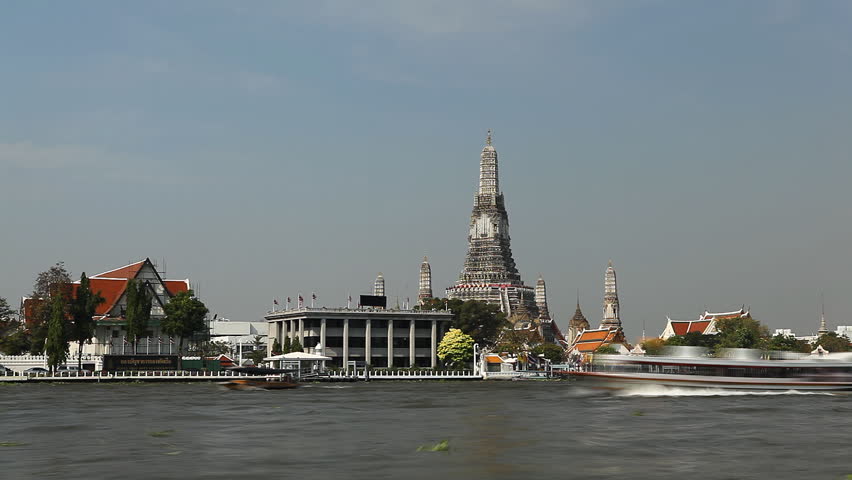 Time Lapse of Wat Arun, Buddhist Temple of the Dawn in Bangkok, Thailand, Chao Phraya River