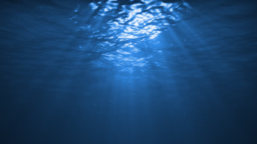 Blue version, water ripples coming towards camera. With tiny particles in the water. Sun rays shinning down. Seamless looping video animation.-
