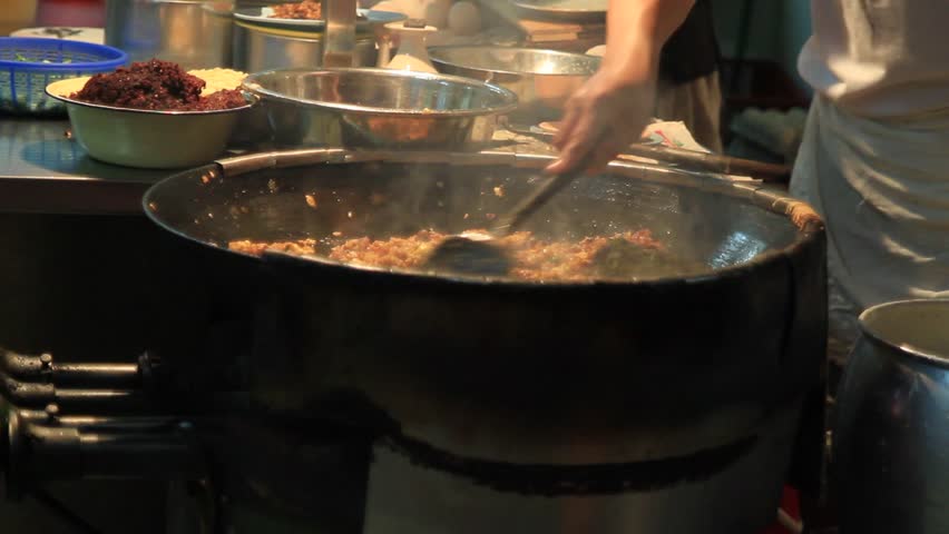 Street Food Fried Oyster Omelette in Melaka Malaysia 1080p Panning