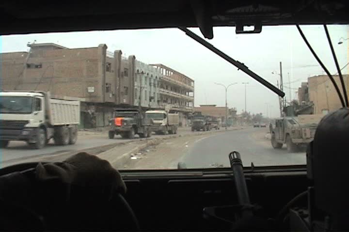 FALLUJAH, IRAQ - CIRCA 1/4/05: Aftermath of the second battle of Fallujah, Iraq; Assault teams and checkpoints.