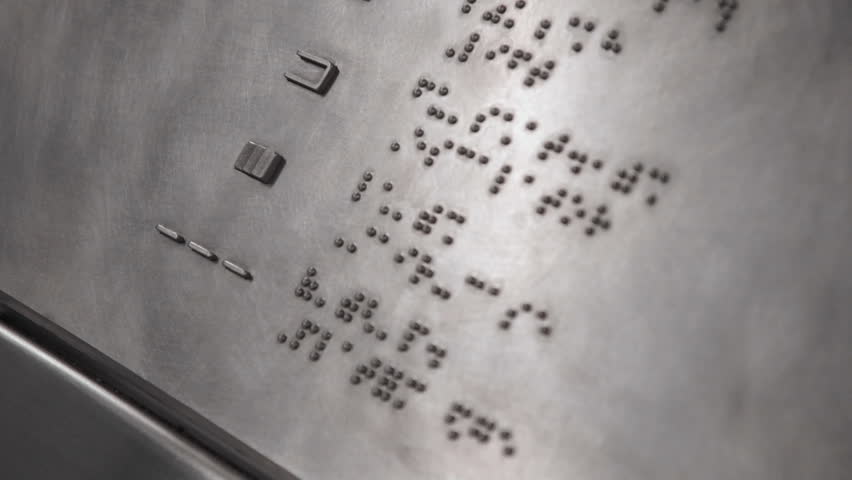 Braille signage with selective focus.