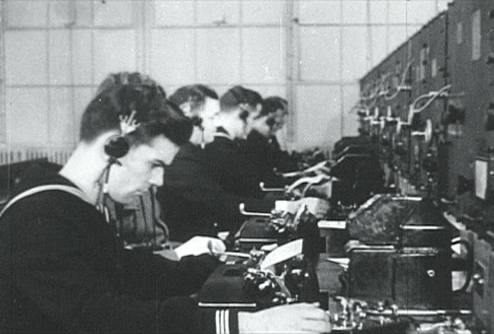 ATLANTIC OCEAN - CIRCA 1942-1944: World War II, Naval Clerks Sending Out Information Via Teletype, publisher National Broadcasting Service (U.S.)