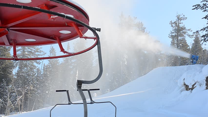 Ski lift wheel and snow cannon