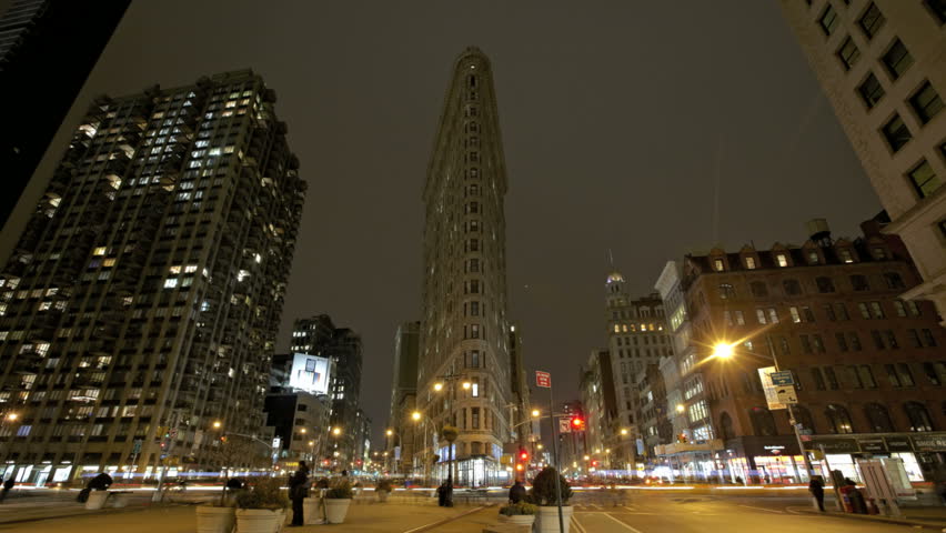 NEW YORK CITY - Feb 10: Timelapse of the Flatiron Building at nighttime on February 10, 2012 in New York City, USA. Flatiron building is considered to be one of the first skyscrapers ever built. 