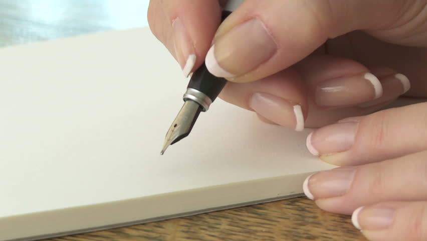 Writing a letter with a fountain pen