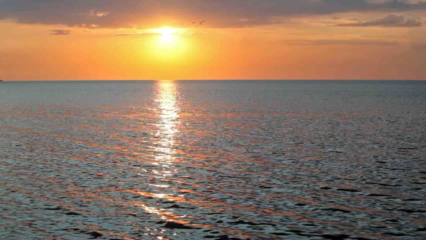 Sea landscape on a decline with clouds and waves