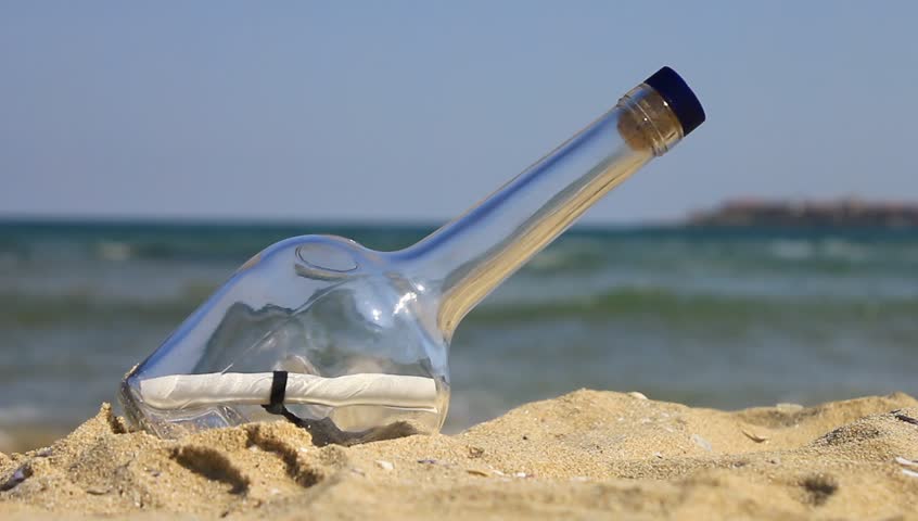 Message in a bottle on the beach 