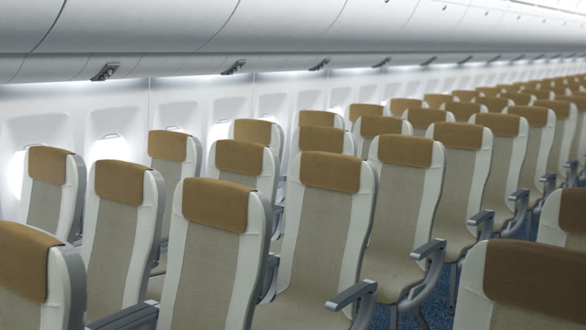 Empty passenger seats in airplane cabin. Seamlessly looping.