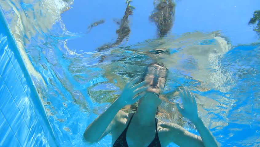 Woman swimming underwater