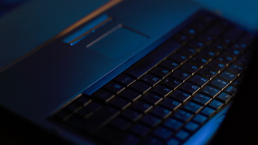 hacker typing on keyboard 3/4