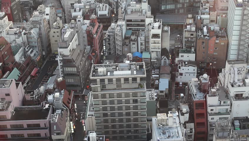 High-rise office buildings and residential apartments in downtown Tokyo, Japan during sunset