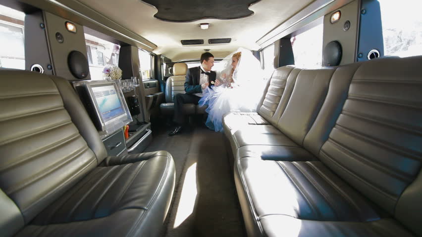 Just Married Young Couple Inside Limo