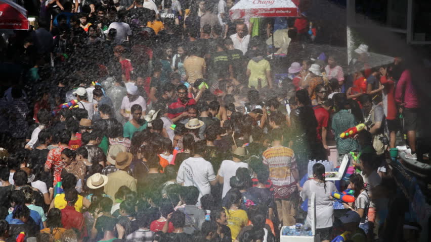 BANGKOK - APRIL 15, 2012: Thai people are celebrating Songkran Water Festival at Silom in Bangkok on April 15, 2012. 