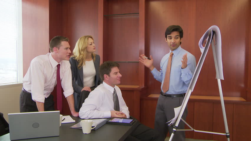 Young Business colleagues making a presentation in an office