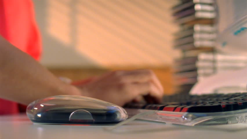 Man on deadline with computer and clock