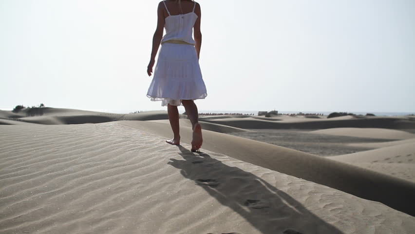 Girl in a white dress walking on the beach images Girl in a white dress walking on the beach images