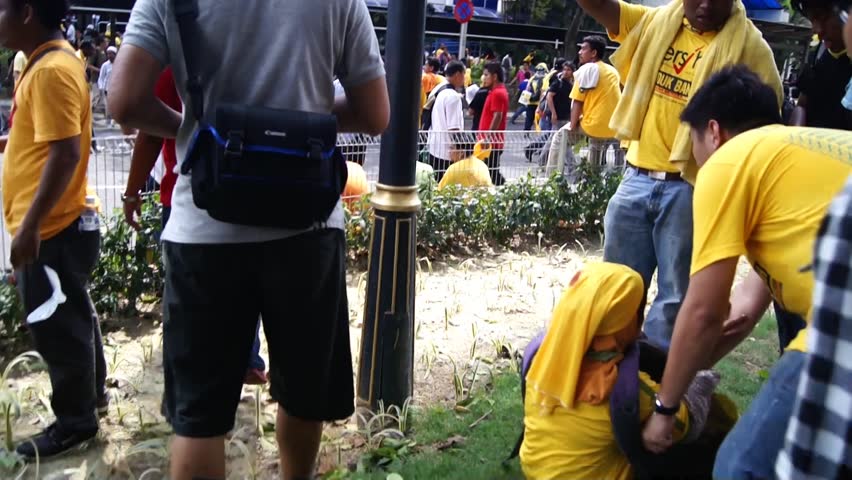 KUALA LUMPUR - APRIL 28, 2012: Protestors march during the Bersih 3.0 rally in Kuala Lumpur, Malaysia on April 28, 2012. The rally was organized by Coalition for Clean and Fair Elections to protest what they perceived as insincere election reforms.
