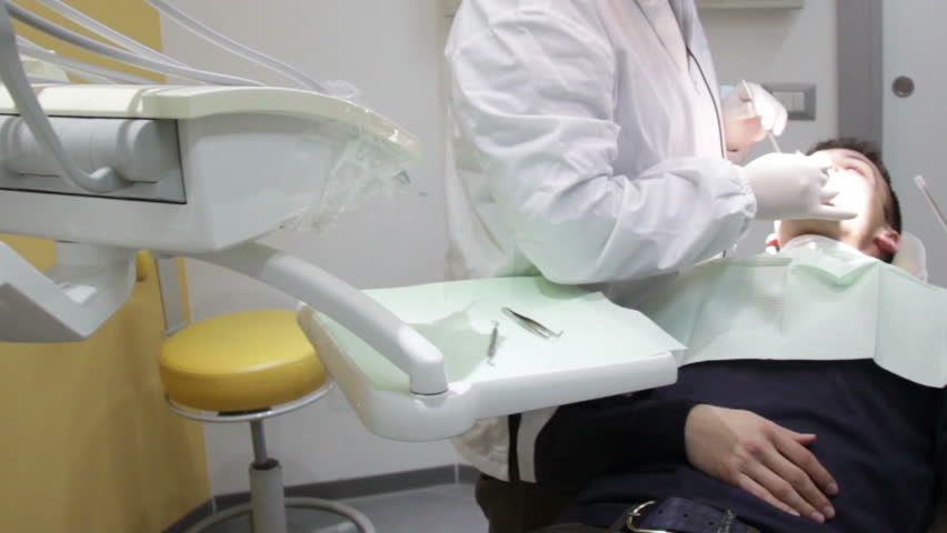 Patient open mouth during oral checkup