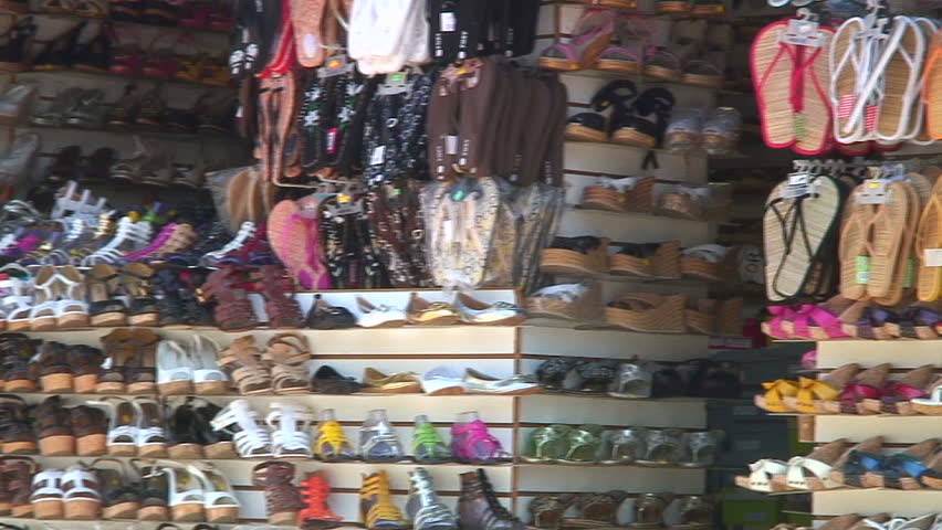 Shoes and sunglasses stand.