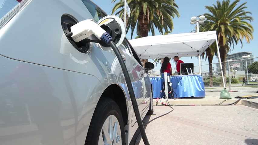 LOS ANGELES - MAY 6: A Prius Plug-in Hybrid Electric Car fast charges at the 26th Electric Vehicle Symposium on May 6, 2012 in Los Angeles, California. Test drives were made available to the pubic at the event.
