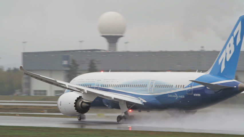 OSLO, NORWAY - MAY 4, 2012: Boeing 787 Dreamliner on its Europe Tour visiting OSL Airport, Oslo. Takeoff on its final day in very rainy conditions at runway 19L